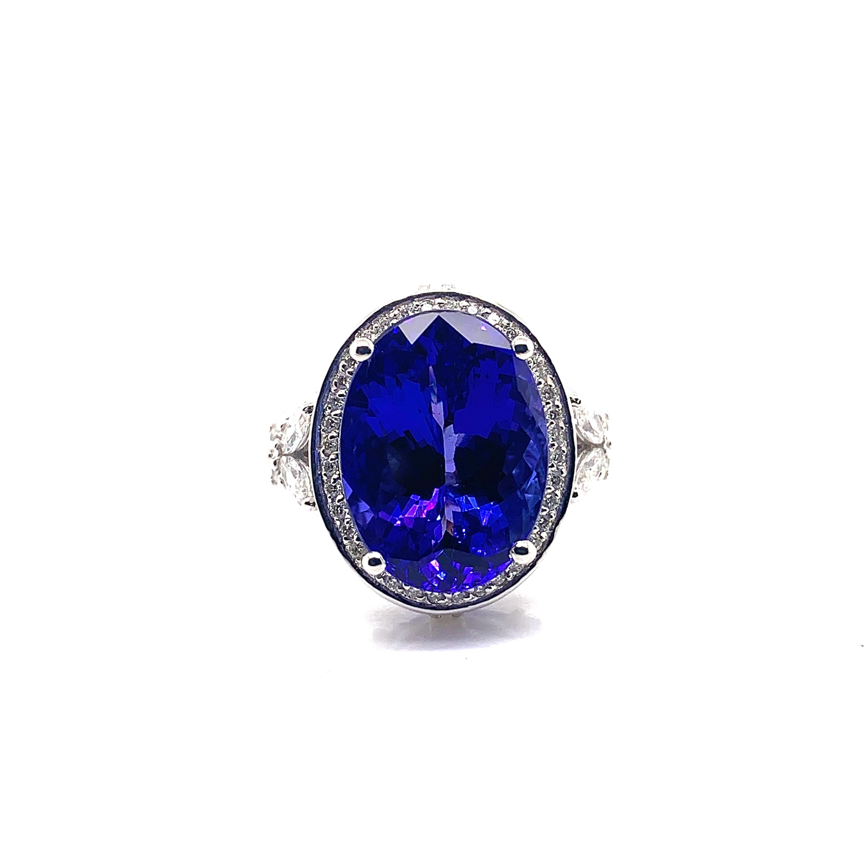 Classic tanzanite ring in 18K white gold with diamonds. 

Tanzanite: 9.01 carat oval shape.
Diamonds: 0.621 carat, G colour, VS clarity. 
Gold: 5.65g, 18K white gold. 