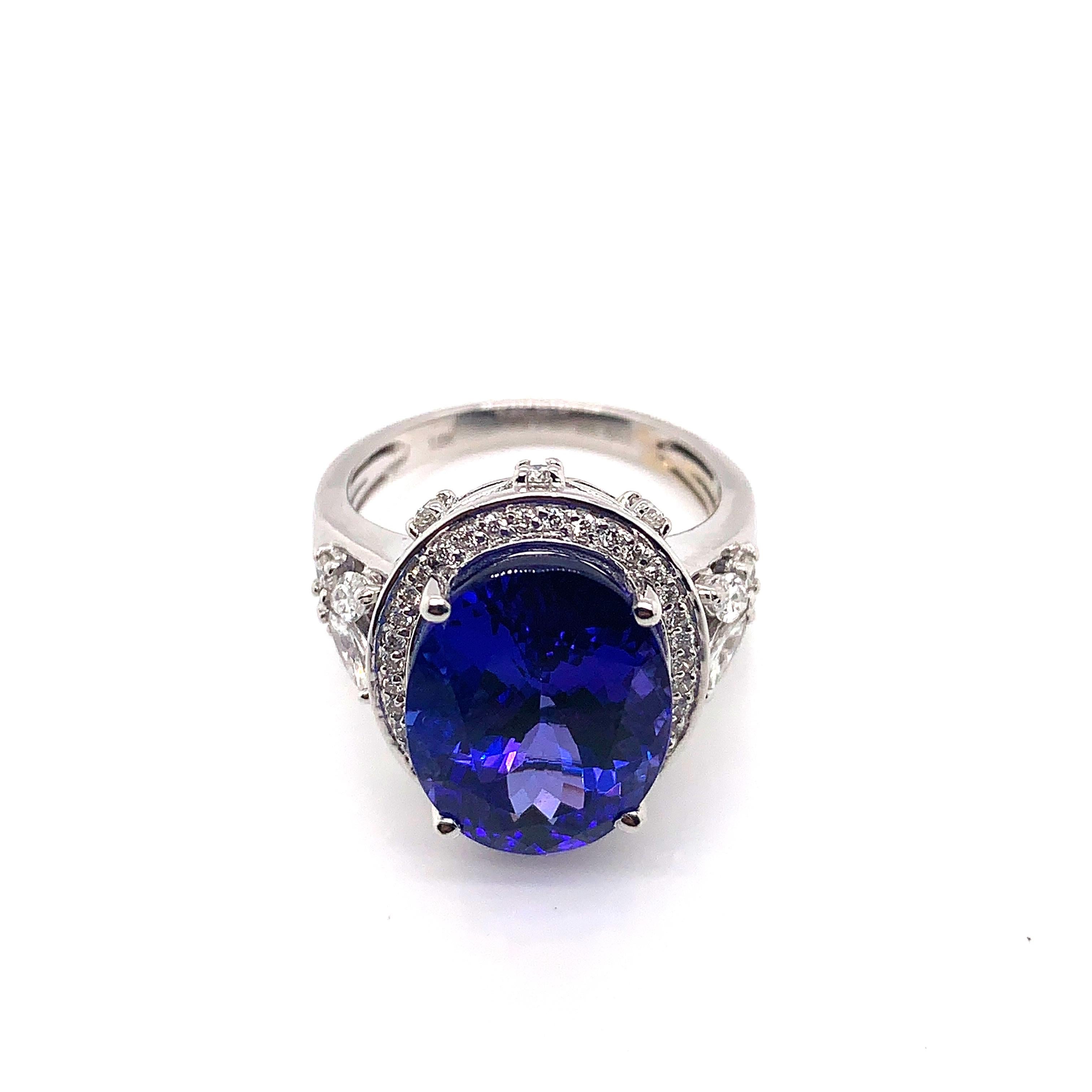 Oval Cut 9.01 Carat Oval Shaped Tanzanite Ring in 18 Karat White Gold with Diamonds For Sale
