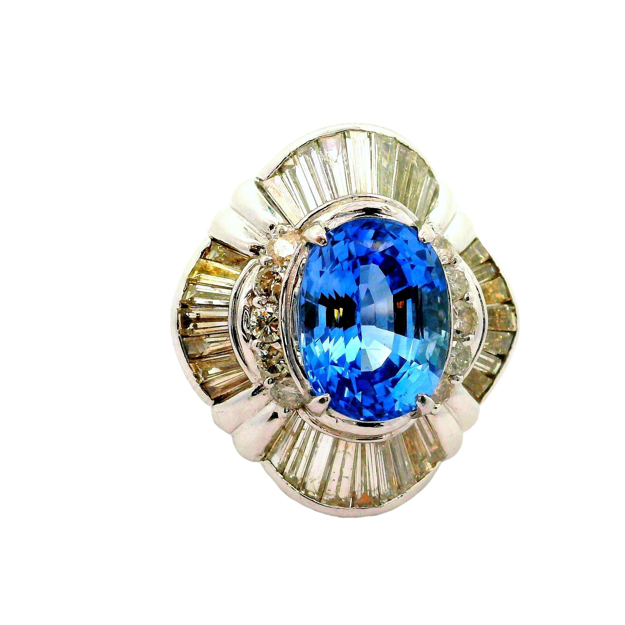 Un saphir bleu saisissant est la pièce maîtresse de cette bague contemporaine. Le saphir, d'une élégante taille ovale, pèse un poids substantiel de 9,03 carats et rayonne d'une couleur bleue vive et vibrante. Autour du saphir, 3,32 carats de
