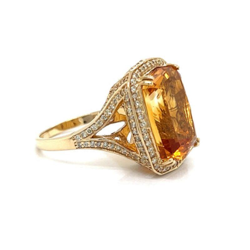 This impressive statement ring features a 9.03 carat citrine center stone, surrounded by a halo of brilliant diamonds. Crafted in 14K yellow gold, its beauty and sparkle will be sure to turn heads.

Additional information:
Style : Ring
Brand :