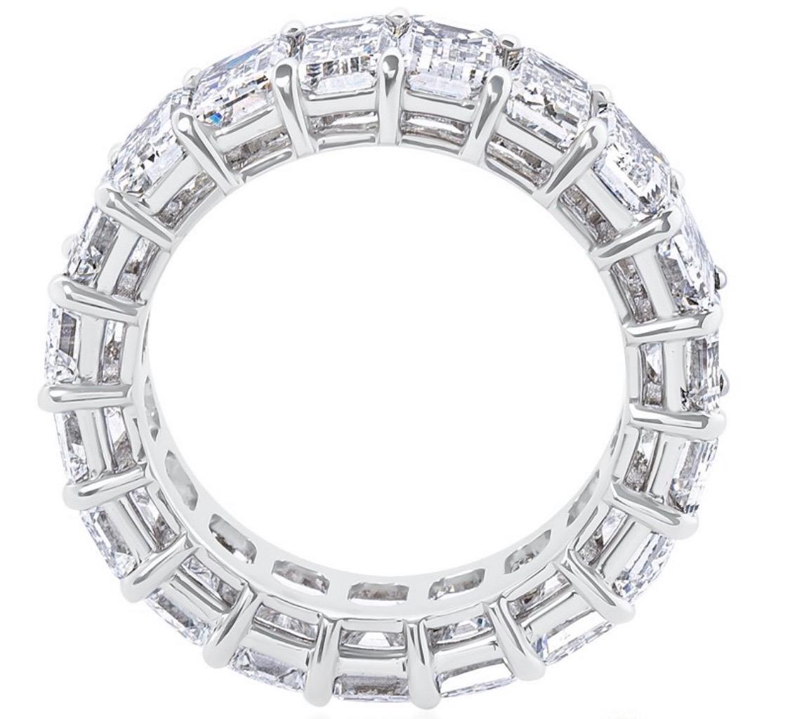 Exquisite emerald cut eternity band. 
15 individually GIA certified emerald cut diamonds weighing 11.40 carats , make up this magnificent ring.
Diamonds are colorless (D E F) and clarity range of VVS - VS. precision cut and perfectly matched 
The