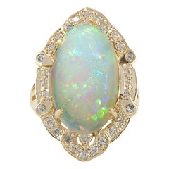 Opal-Diamantring aus 14 Karat Gelbgold 