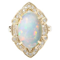 Bague en or jaune massif 14 carats avec opale naturelle et diamants