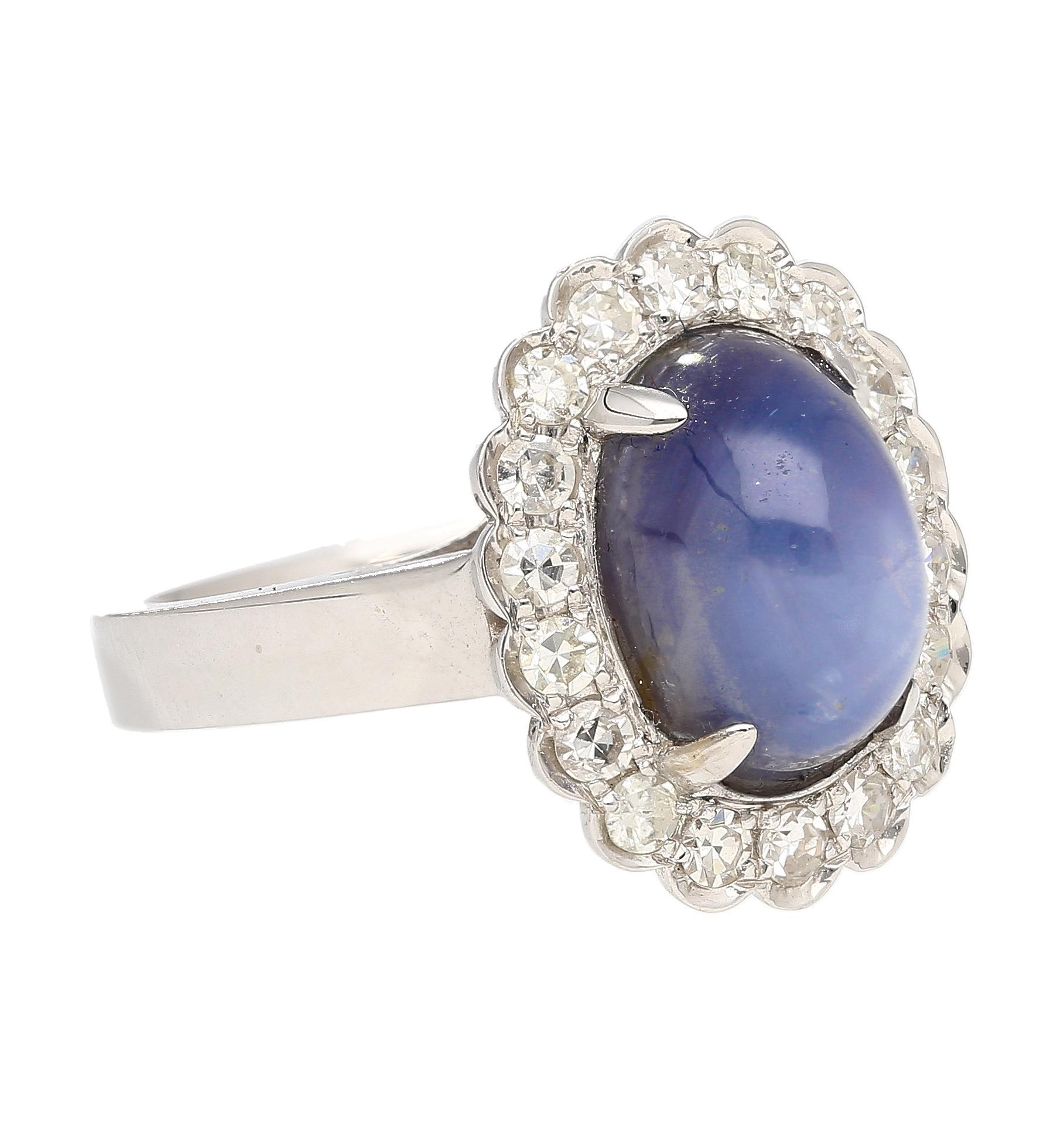 Contemporary 9.07 Carat Blue Star Sapphire & Diamond Halo Ring in 18K White Gold For Sale