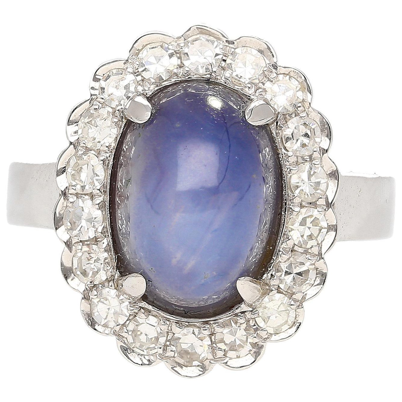 Bague étoile bleue de 9,07 carats et halo de diamants en or blanc 18 carats