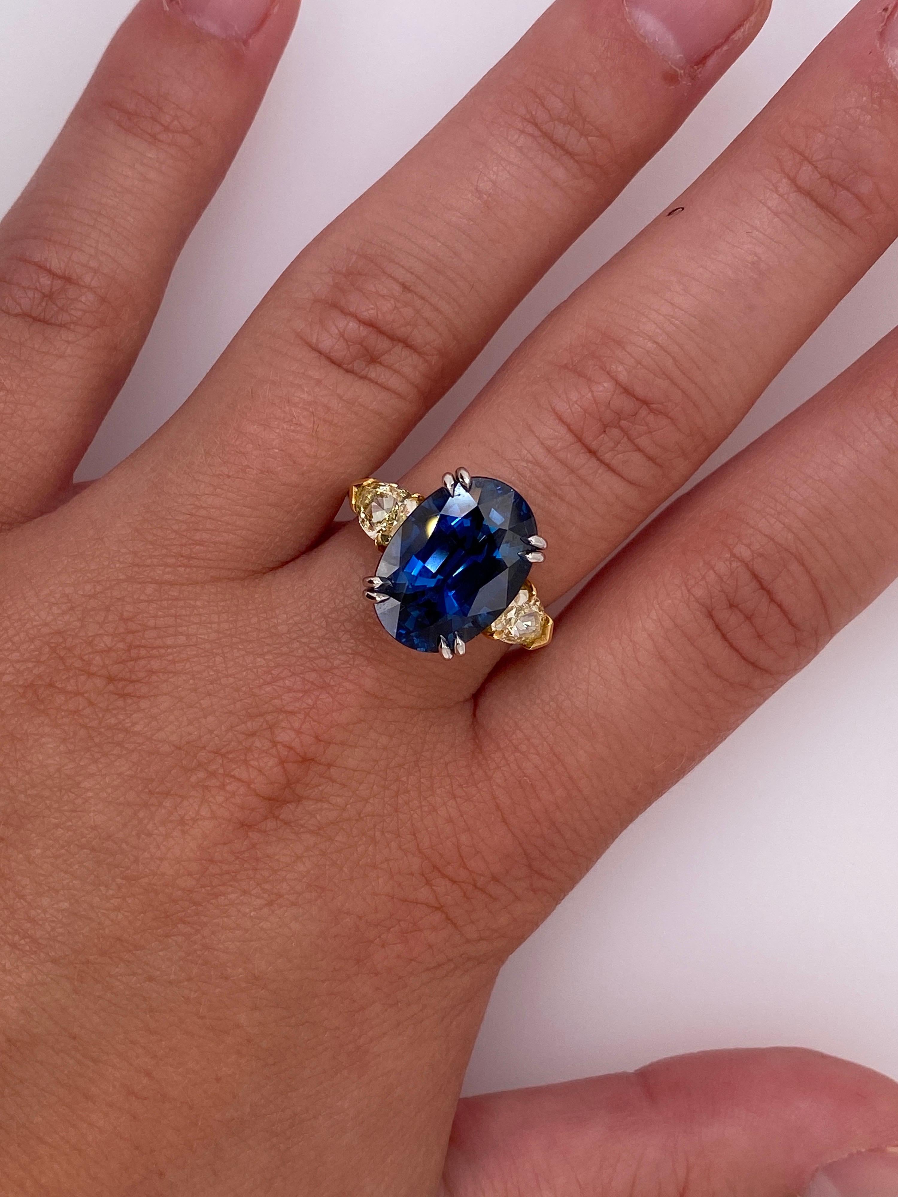 Oval Cut 9.08 Carat Oval Blue Sapphire and Fancy Yellow Diamond Platinum and 18k Ring For Sale