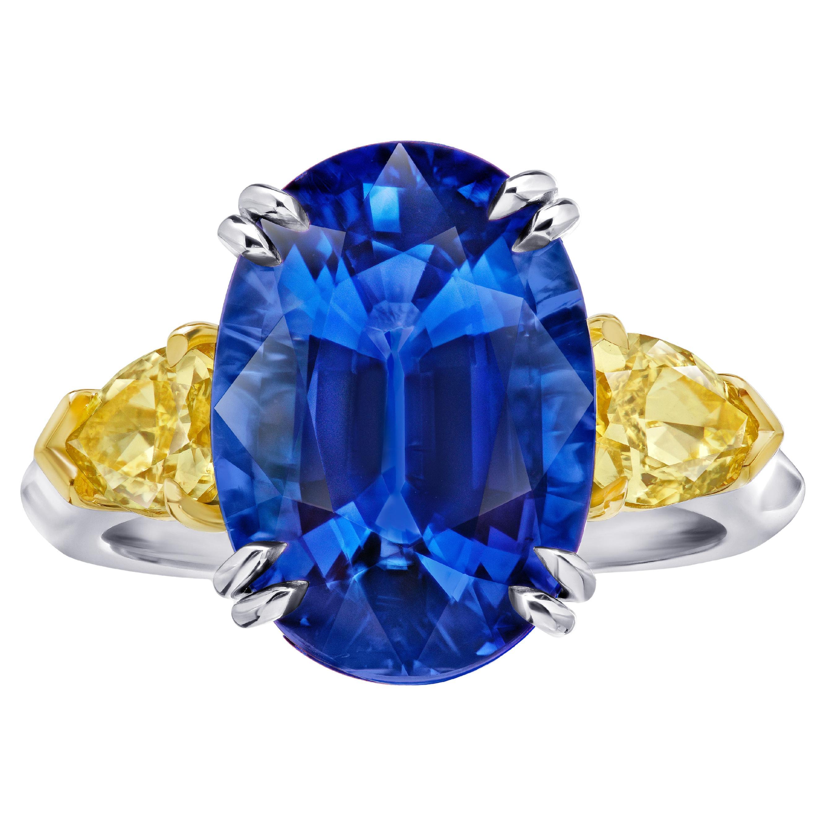 Anello da 9,08 carati con zaffiro blu ovale e diamante giallo fantasia in platino e 18 carati