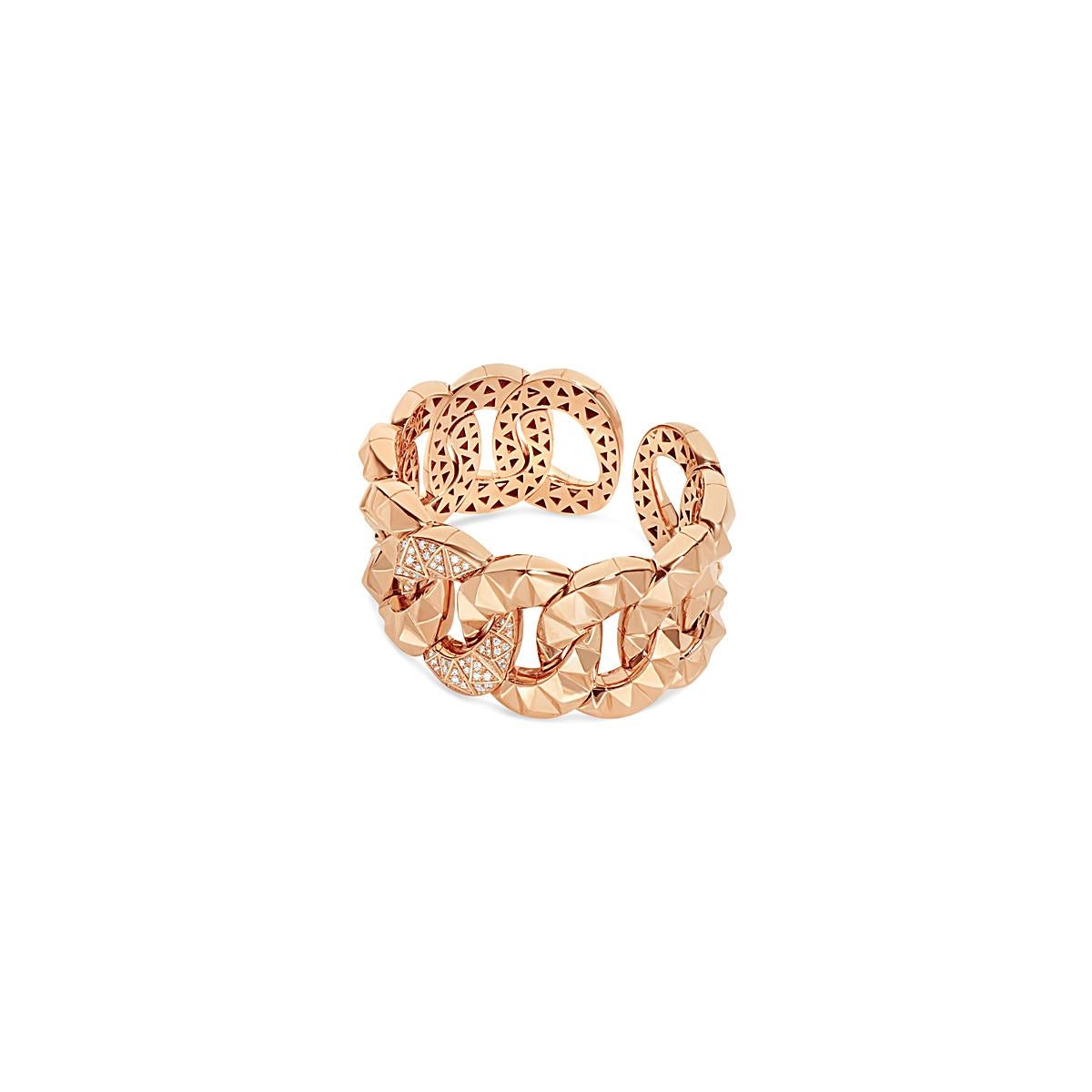 Gourgeous groumette bracelet, crafted in 18kt rose gold, features a sparkling pavè of white diamonds, which have been intricately handcrafted for flawless results. 
Suitable for sophisticated and strong women, this cuff bracelet becomes a unique