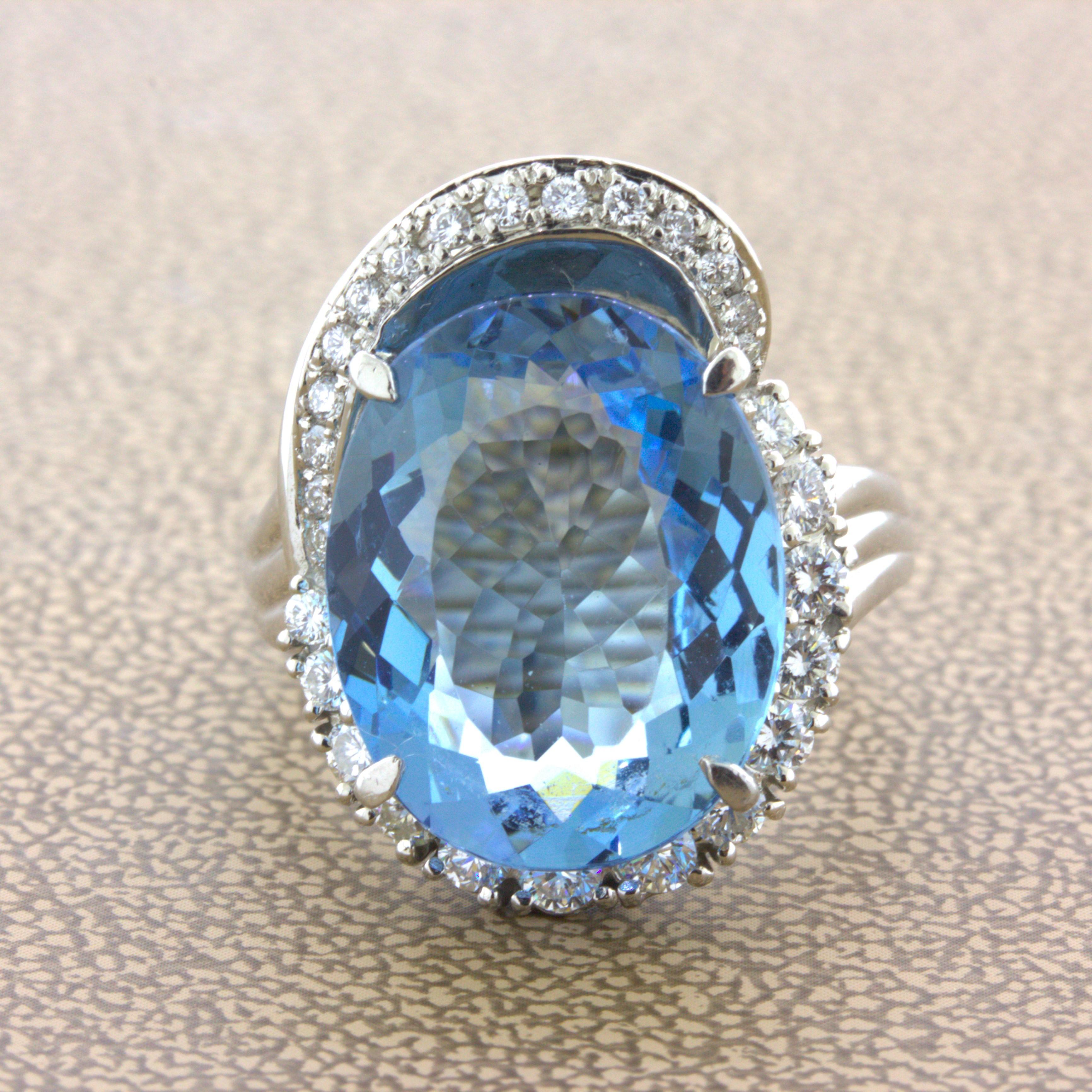 9.09 Carat Aquamarine Diamond Platinum Ring

A lovely and chic gemstone ring featuring a fine 9.09 carat aquamarine. It is shaped as an oval and has the ideal rich sea-blue color which aquamarine is known for. It is complemented by 0.74 carts of