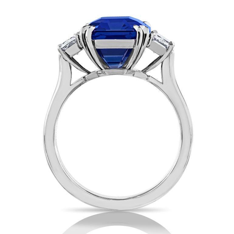 Contemporary 9.09 carat Emerald Cut Blue Sapphire (H) and Diamond Platinum ring For Sale
