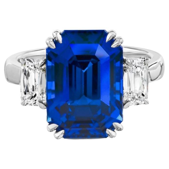 9.09 carat Emerald Cut Blue Sapphire (H) and Diamond Platinum ring