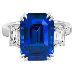 9.09 carat Emerald Cut Blue Sapphire (H) and Diamond Platinum ring