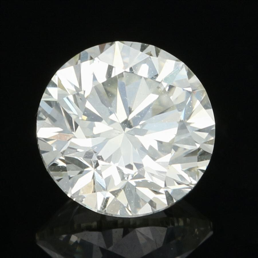 Shape/Cut: Round Brilliant 
Clarity: SI1
Color: N 
Dimensions (mm): 5.93 - 5.96 x 3.95 
Weight: 0.90ct

Cut: Good
Polish: Very Good
Symmetry: Very Good  

GIA Report Number: 5202397197 

Condition: New with Tags  
Please check out the enlarged