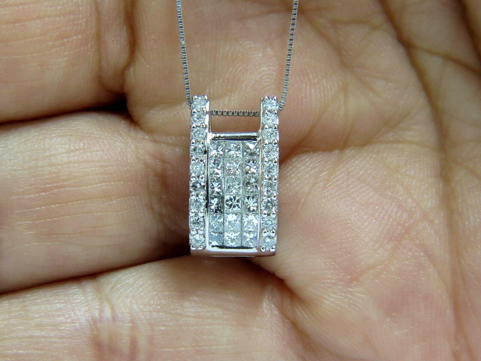 Modern Cut Edge Deco

Square cluster of princess' and rounds

3D raised side two columns

Invisible set princess cut diamonds.

Total weight: .90ct.

G/H-color, Vs-2 clarity

17.5 inch necklace included

Total 5 grams

Pendant measures:

15.5mm long