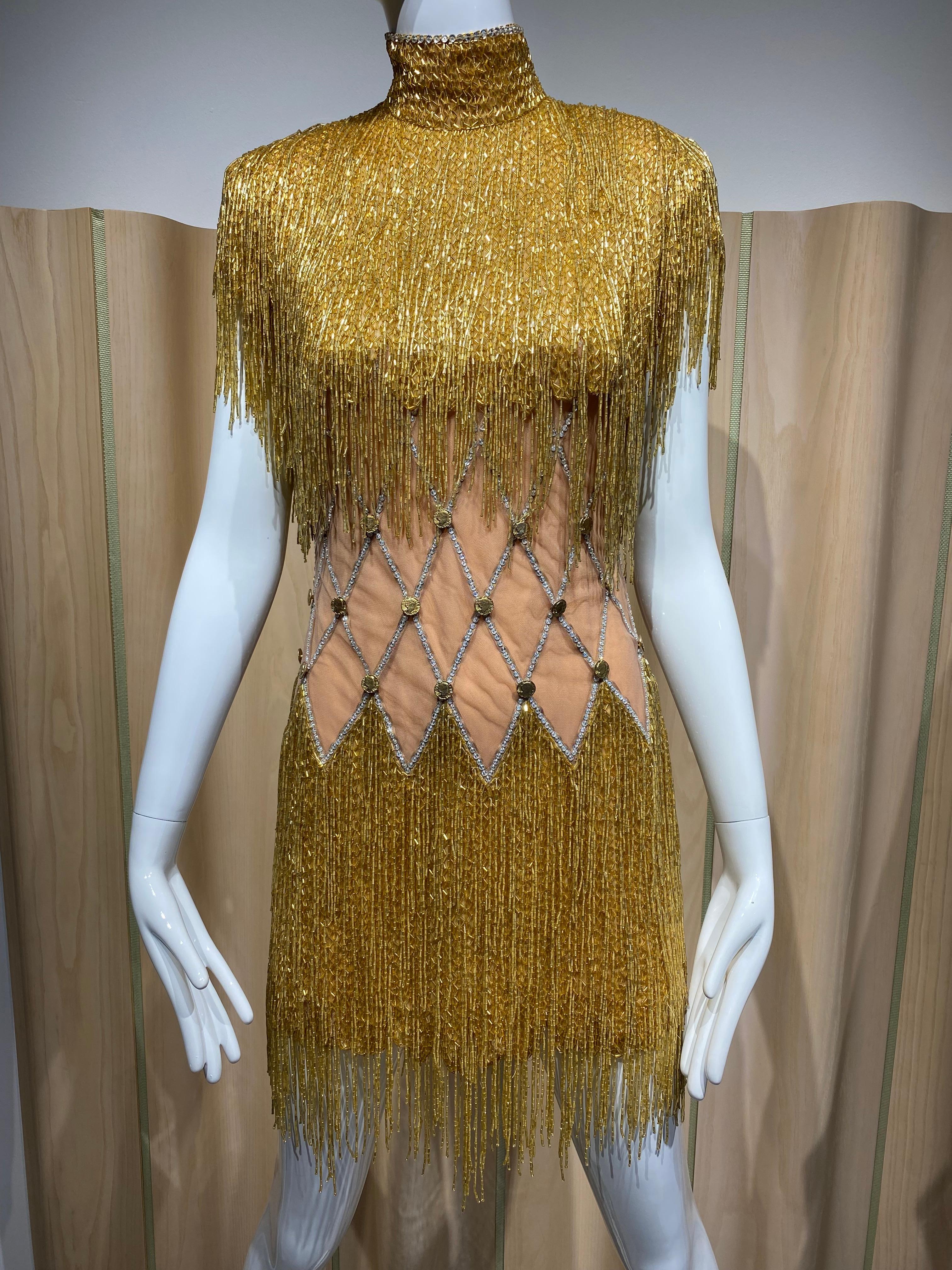 1990s BOB MACKIE gold beaded fringe tassel cocktail dress. Perfect for Holiday Party! 
( see editorial page )
Bust: fit up to 36”
Waist fit up 29”
Hip fit up to 36”
Dress length : 35” 
Shoulder : 16”