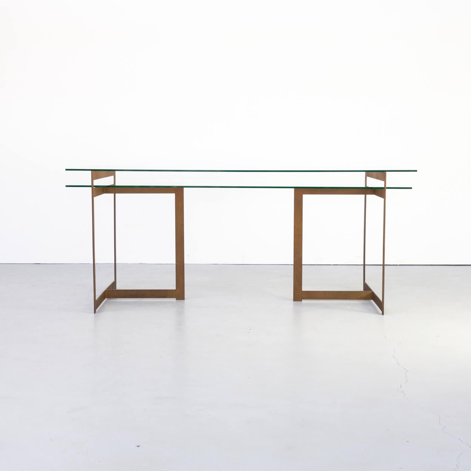 Cees dam architect of the Dutch Stopera building also designed furniture. This glass writing desk is a true and original example of his interior designs. Dam is famous over his building designs, like Stopera, house of the future, etc.
