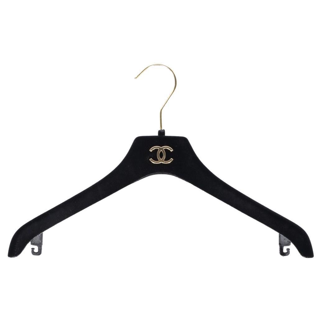 90s Chanel black velvet slim clothes hanger