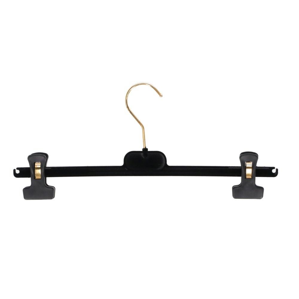 Chanel black velvet clothes hanger with side clips and front gold-tone logo.

Flat measurements 
Lenght: 35 cm
Bust: 2 cm

Product code: X1636

Composition: Plastic - Metal

Made in: France

Condition: Very good conditions