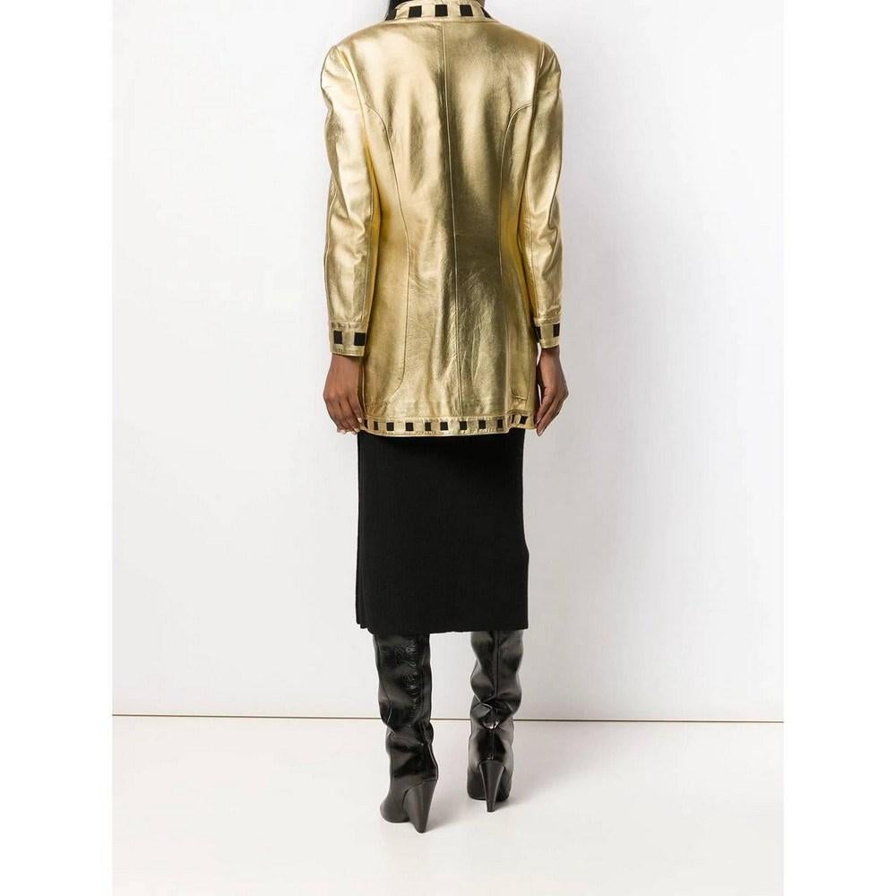 Women's 90s Chanel Vintage gold-tone leather jacket hemmed with black details