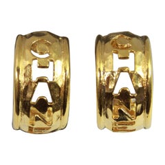 90's Chanel Vintage  Logo Earrings in Gold-Plated Metal