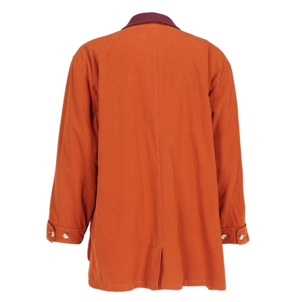 Emporio Armani orange cotton upcycled coat with burgundy contrasting collar. Front concealed zip fastening and buttoning and pockets with flap.

Size: 48 IT

Flat measurements
Height: 85 cm
Bust: 62,5 cm
Shoulders: 56 cm
Sleeve: 57 cm

Product code: