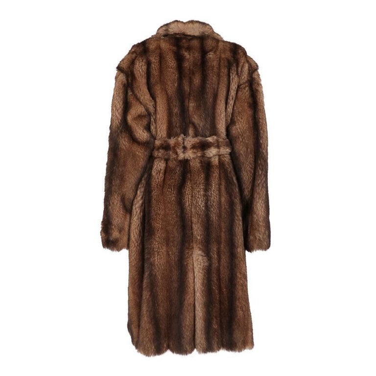 Filippo Alpi shaded brown faux fur coat. Wide lapels collar, two-buttons front fastening, removable fur waist belt and two vertical welt pockets.

Size: XL

Flat measurements
Height: 119 cm
Bust: 63 cm
Shoulders: 51 cm
Sleeves: 64 cm

Product code: