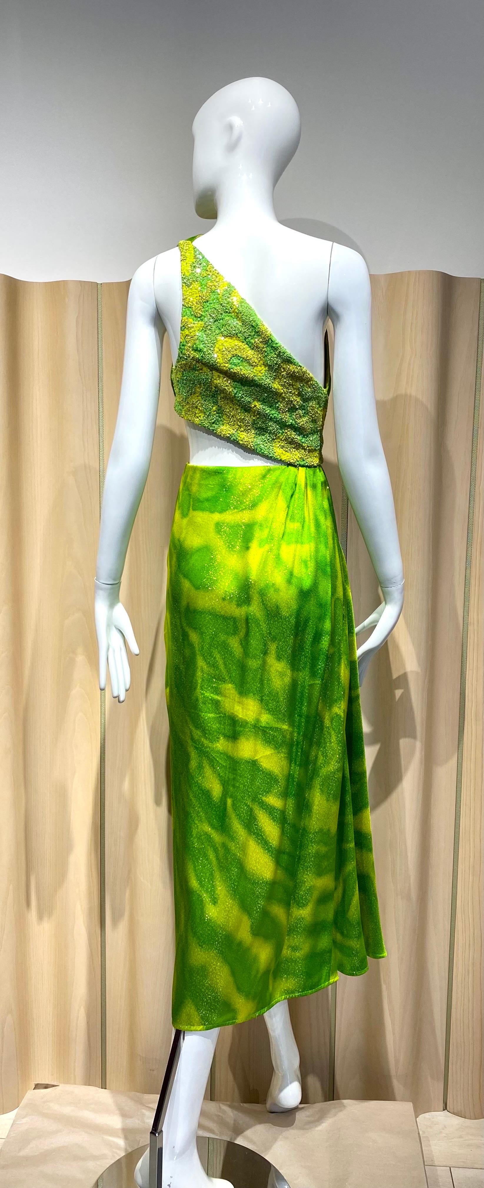1992 Geoffrey Beene Lime green chartreuse print Grecian cut out gown mit mehrfarbigen Pailletten.
siehe beigefügtes Foto der Startbahn.
Markierte Größe 4, aber es passen Größe modern Größe 2 
Maße: Büste 32,5