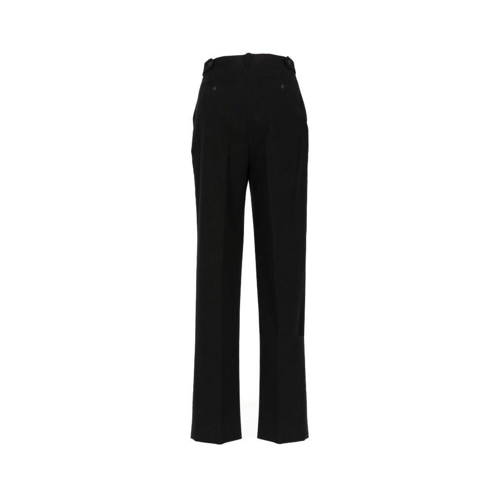 Gianfranco Ferré Golf black cotton blend trousers. High-waisted model and front closure with button and zip. Side and back welt pockets and decorative waistband with button.

Flat measurements size: 46 IT
Height: 110 cm
Waist: 36 cm
Internal leg: 78