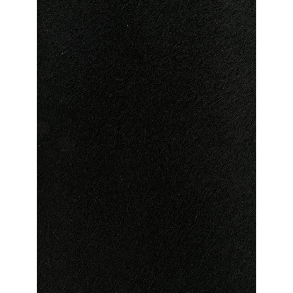 90s Gianfranco Ferré black wool tie. Pointed design model.

Measurements
Width: 9 cm

Product code: A6405

Composition: 100% Wool

Made in: Italy

Condition: Very good conditions
