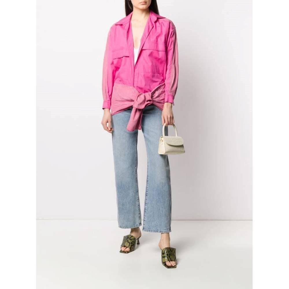90s Gianfranco Ferré pink cotton shirt with suede inserts. Classic collar and two chest patch pockets. Front closure with bow and long sleeves.

Size: 40 IT

Flat measurements
Height: 79 cm
Bust: 45 cm
Shoulders: 47 cm
Sleeves: 50 cm

Product code: