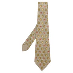 90s Hermès Vintage taupe silk tie with ibexes and leaves print