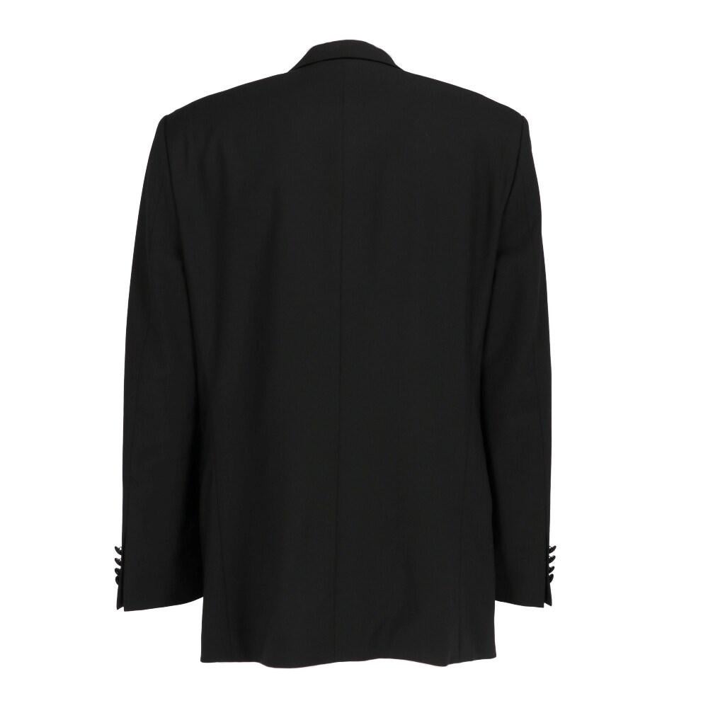 Hugo Boss black wool jacket. Peak lapels collar, double-breasted front closure and welt pockets. Long sleeves and buttoned cuffs.

Taglia: 50 IT

Flat measurements
Height: 85 cm
Bust: 53 cm
Shoulders: 47 cm
Sleeves: 66 cm

Product code: