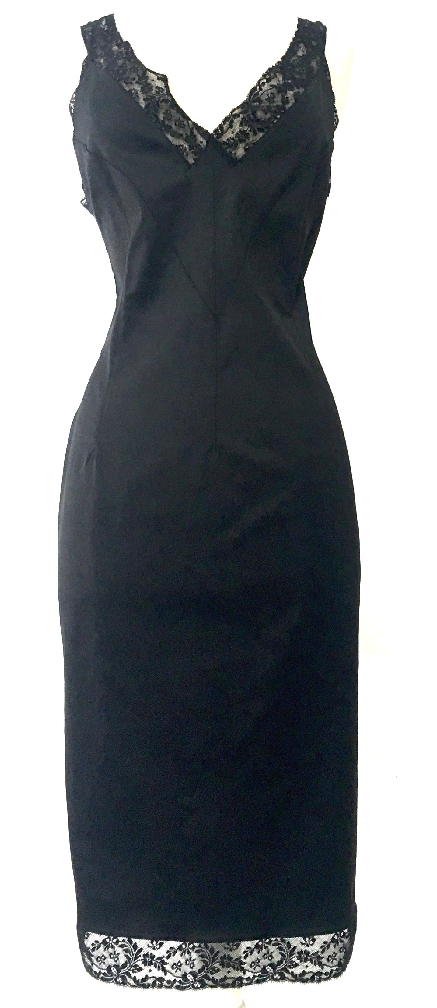 90'S Iconic Italian Dolce & Gabbana (D&G) Little Black Slip Style Dress. This forgiving form fitted stretch black 