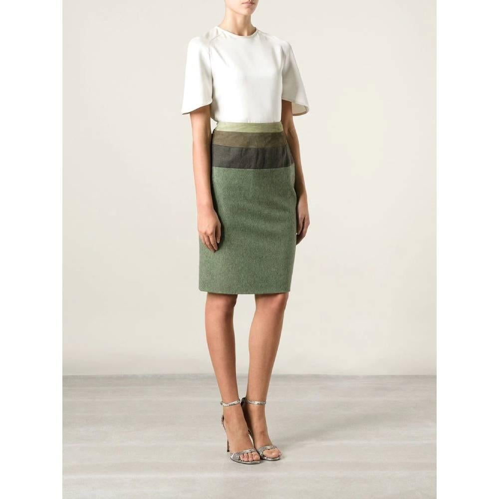 Jean-Louis Scherrer green wool blend skirt. High waist, decorative suede bands and back zip closure.

Size: 36 IT

Flat measurements
Height: 59 cm
Waist: 32 cm
Hips: 44 cm

Product code: A6167

Notes: The item shows some signs of wear on the suede