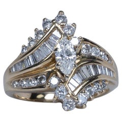 Anello anni '90 con diamante taglio marquise in oro giallo