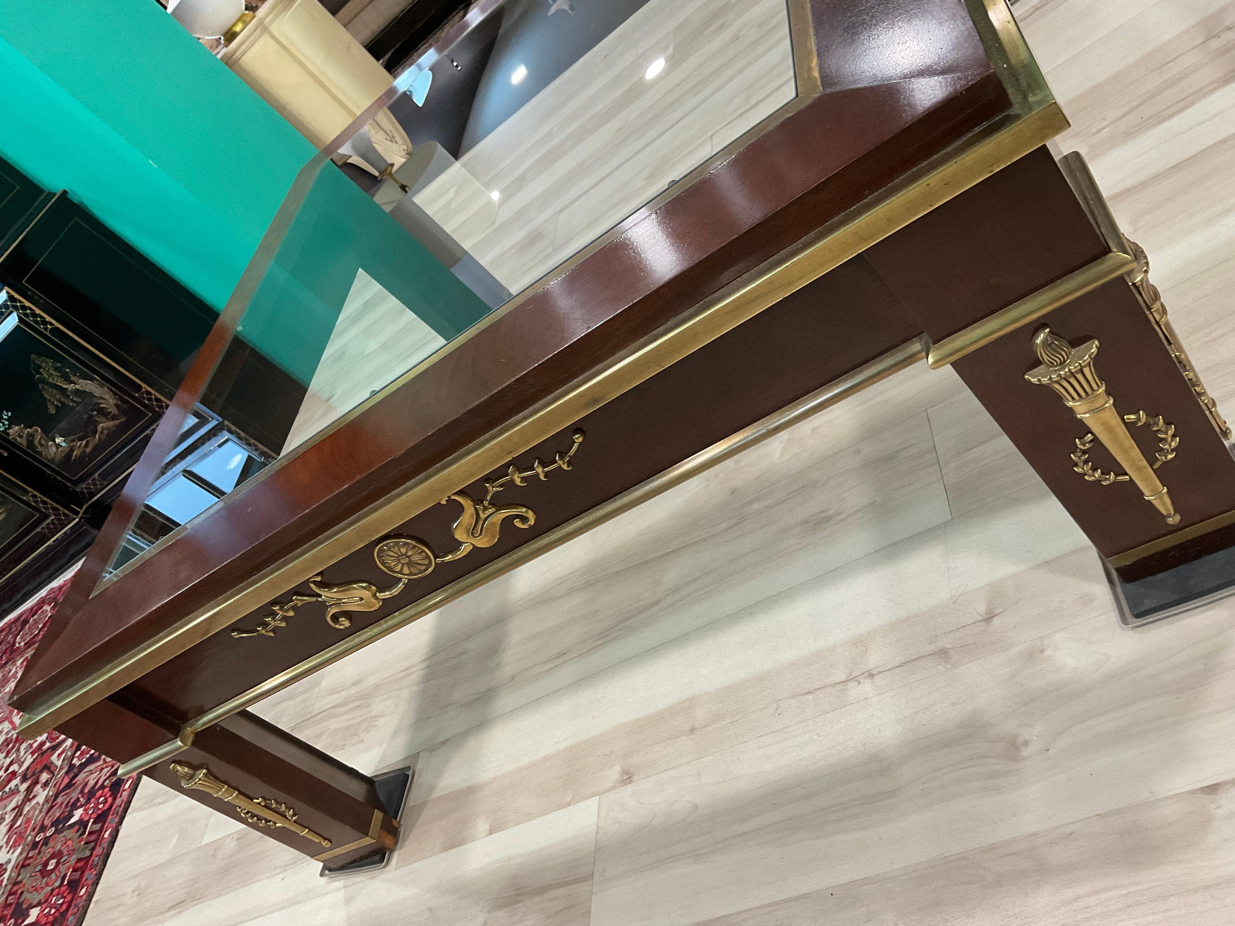 Gorgeous Brass Embellished neoclassical Coffee Table from Mastercraft. Incredible brass appliqué and trim detailing. Glass top. Beautiful piece.

Condition Disclosure:
Please understand nearly all of our inventory is comprised of rare to very rare