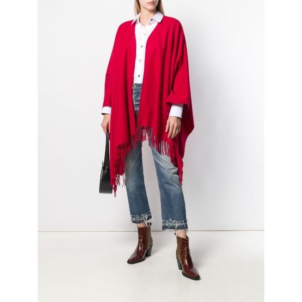 Moschino red wool cape with fringes on the edges and embroidered logo.

Measurements
Height: 110 cm

Product code: A6061

Composition: 100% Wool

Made in: Italy

Condition: Very good conditions