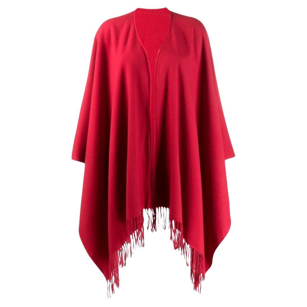 90s Moschino red wool cape with fringes and logo