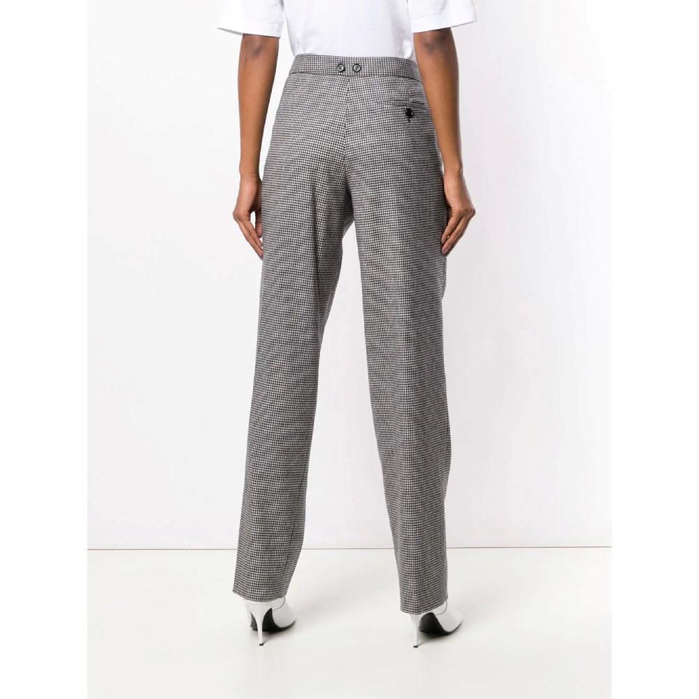 Women's 90s Moschino Vintage black and white houndstooth wool trousers