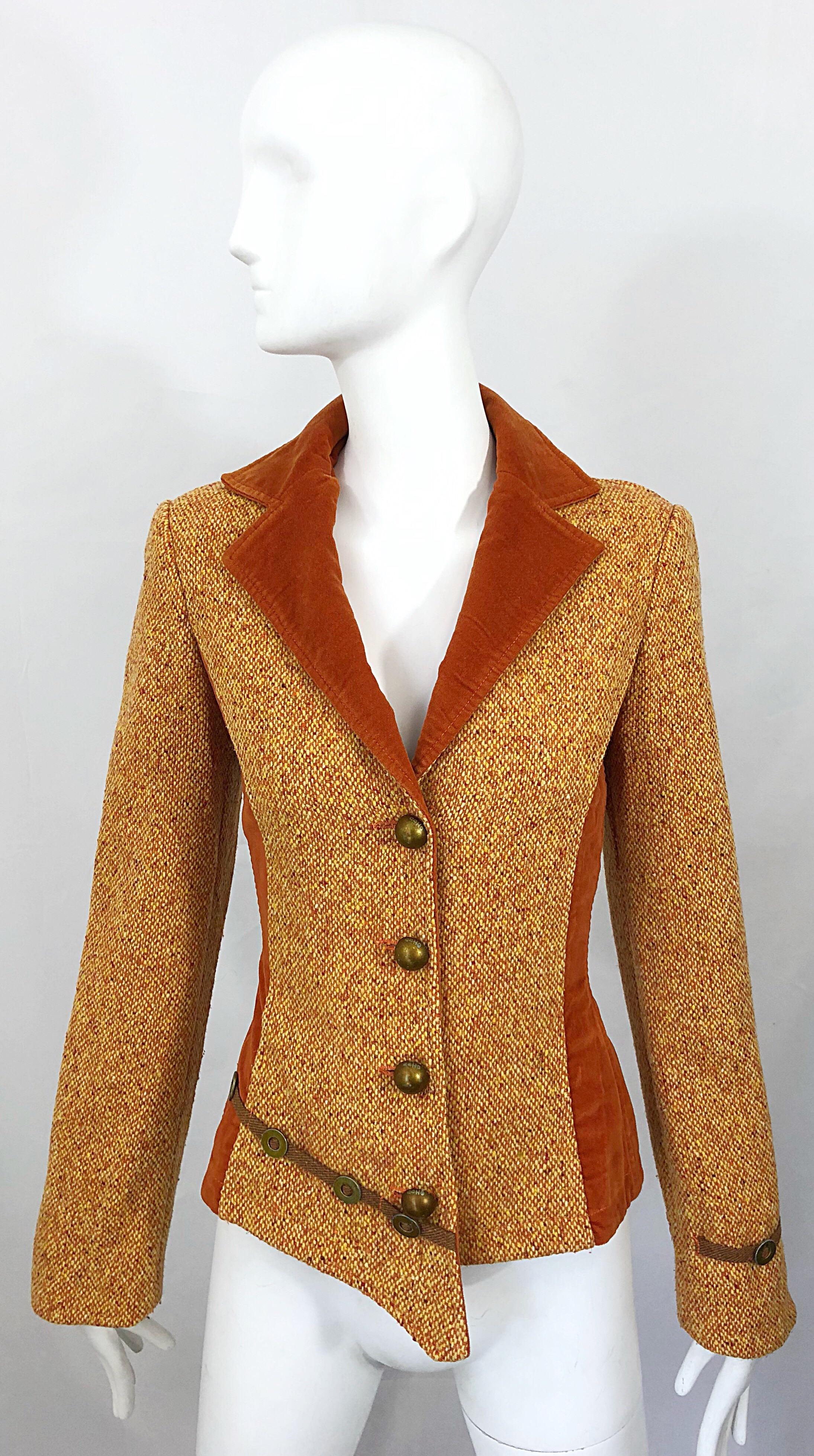 Rare and Stylish late 1990s vintage OHDD Italian made Avant Garde asymmetrical blazer jacket! Features burnt orange velvet accents throughout, with a marigold and orange soft virgin wool. Asymmetrical hemline with brown suede buckles. Fully lined in
