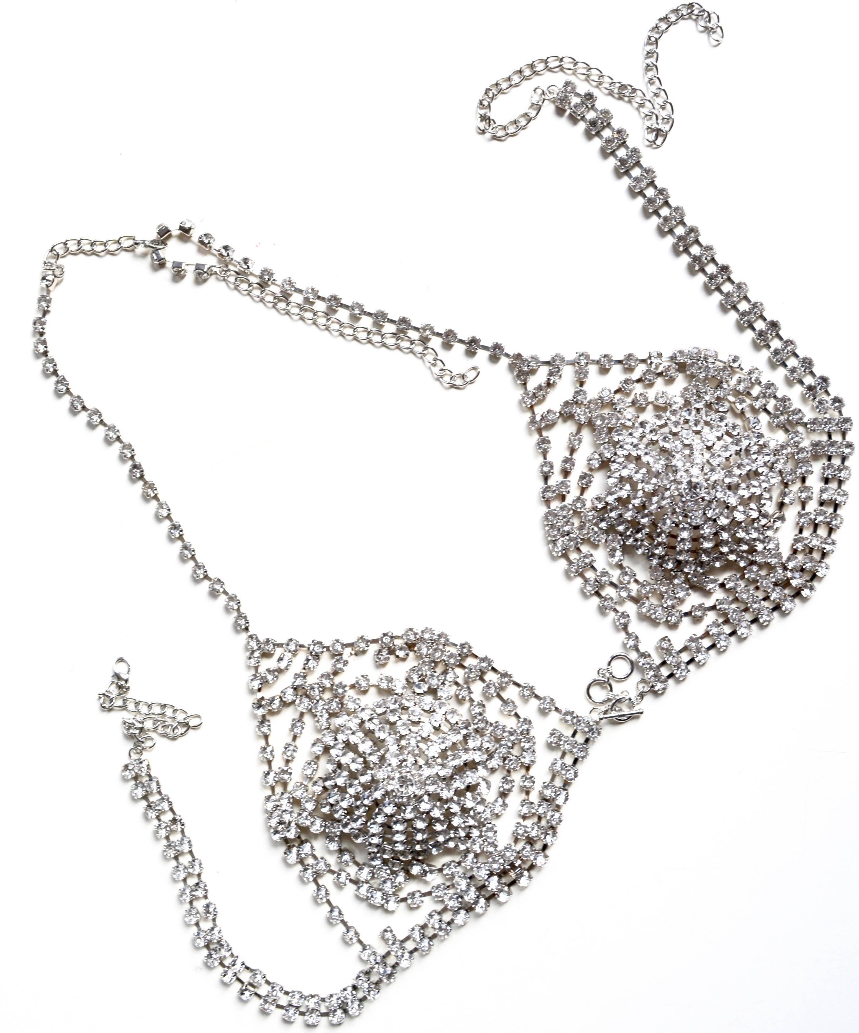 Rhinestone bra made in the 1990s with adjustable aspects to fit various sizes, but the cups measure about 5
