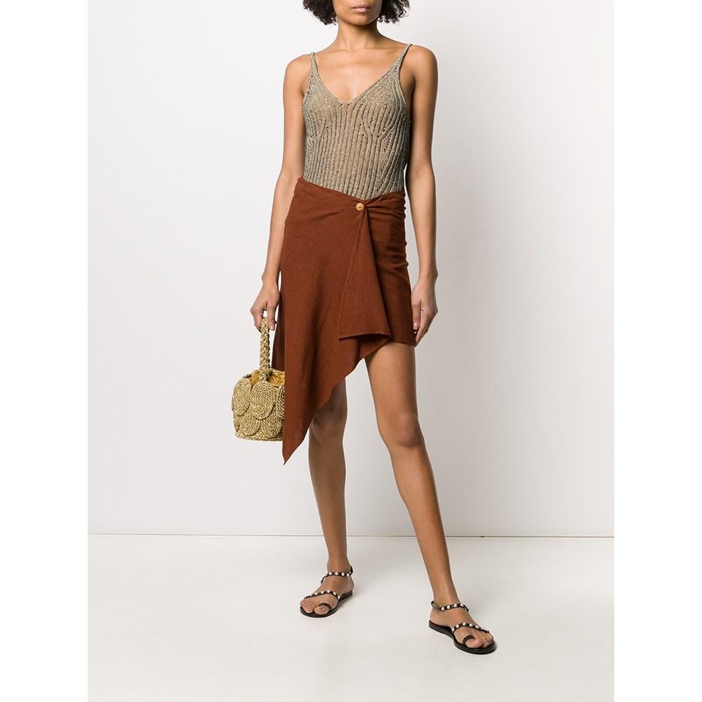 Romeo Gigli brown silk skirt. Wrap model with central button and asymmetrical design.

Flat measurements size: 40 IT

Height: 71 cm
Waist: 34 cm
Hips: 38 cm

Product code: A6159

Notes: This item belongs to a deadstock, it has never been worn and