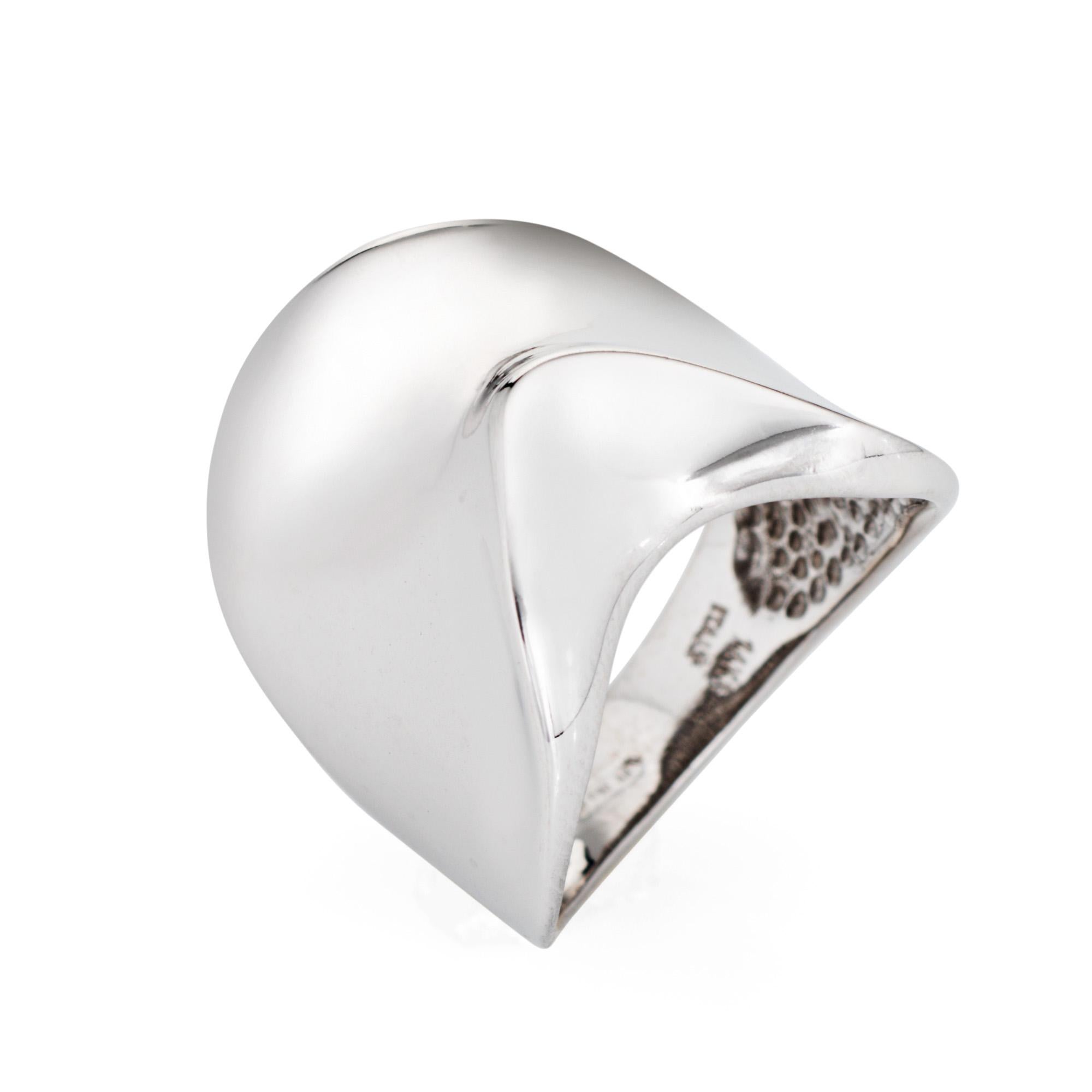Stylish vintage sculptural ring (circa 1990s) crafted in 14 karat white gold. 

The distinct & stylish ring features a sculpted undulating design that makes a bold statement on the hand. The low rise ring (5mm - 0.19 inches) sits comfortably on the