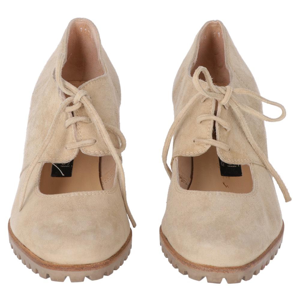 Sergio Rossi beige suede shoes. Lace-up model and open detail.

The item shows some sings of wear as shown in the pictures.

Years: 90s
Made in Italy

Size: 37 ½ EU  
Heel: 7 cm  
Insole: 24,5 cm 