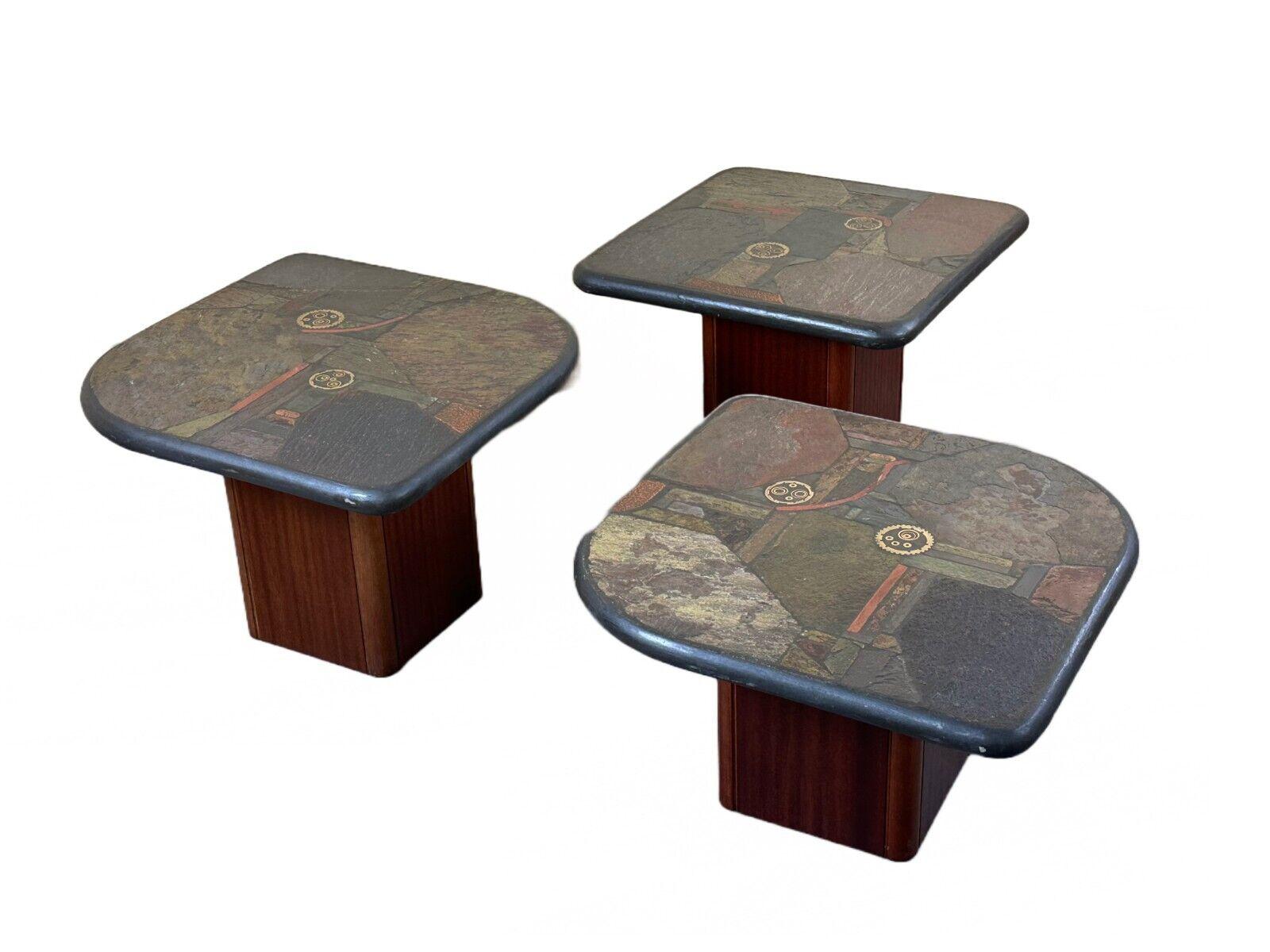 90s set of 3 brutal coffee tables with mosaic by Paul Kingma for Kneip

Object: Set of 3 coffee tables

Manufacturer: Kneip, Germany

Condition: good - vintage

Age: around 1990

Dimensions:

Width = 64.5cm
Depth = 64.5cm
Height =