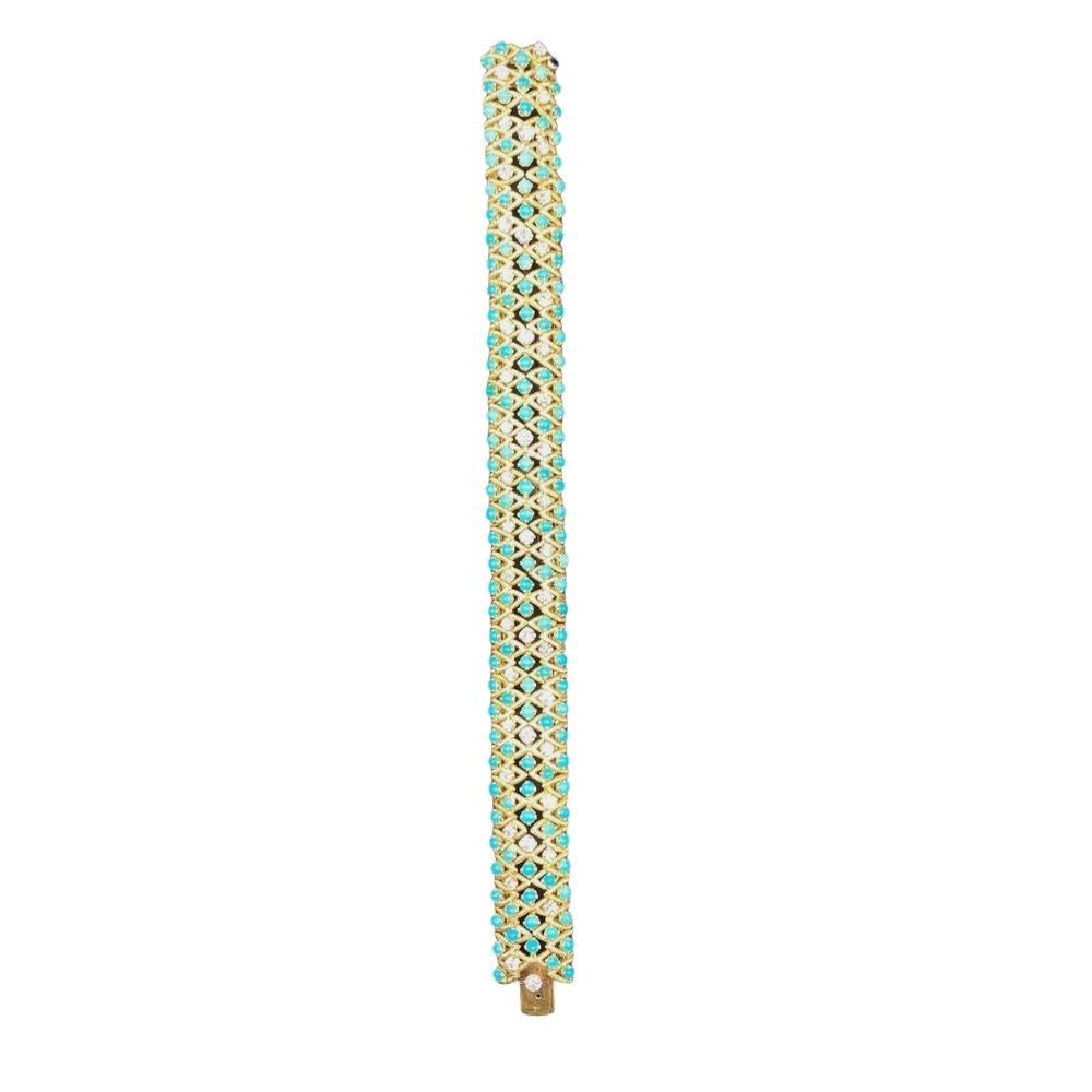 80's-90's style turquoise diamond bracelet featuring a combination if round diamonds and turquoise, set in a handmade 18K gold flexible tennis bracelet. 

Overall Excellent Condition with no signs of wear. 

