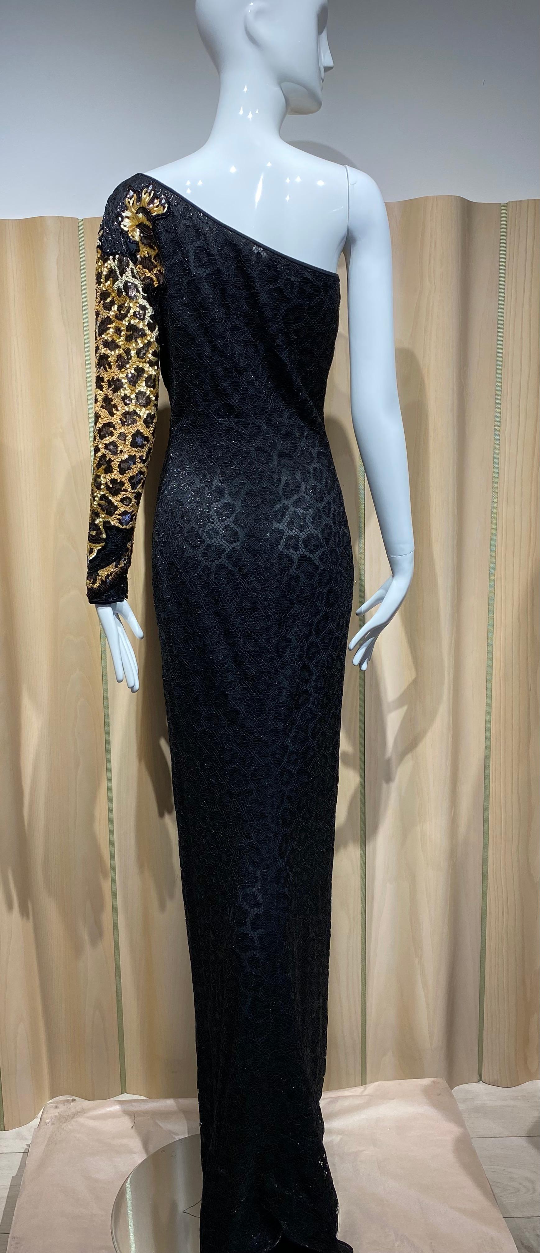 1992-93 Valentino one shoulder black lace dress with gold and black Leopard sequins on the sleeves.
lace has metallic sheen to it.
Fit size 4
Bust 34”
Waist 27”
Hip : 36”
Length Front : 61”/ back 65”