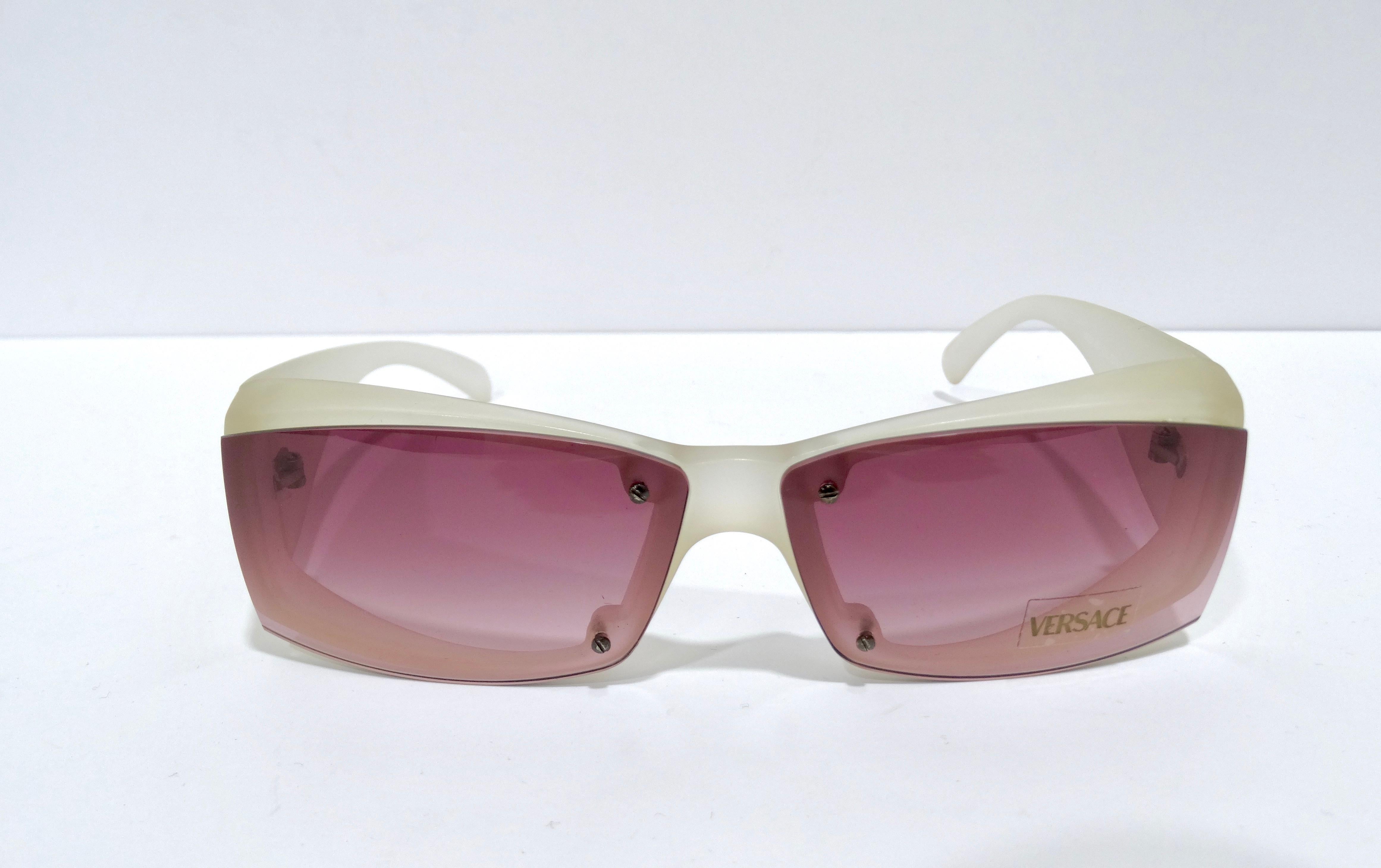 Everyone needs a pair of edgy sunglasses in their collection. This can take any outfit up 10 notches. These violet lenses is perfect to add a pop of color to any outfit and the modern touches will keep you reaching for them. Features include violet