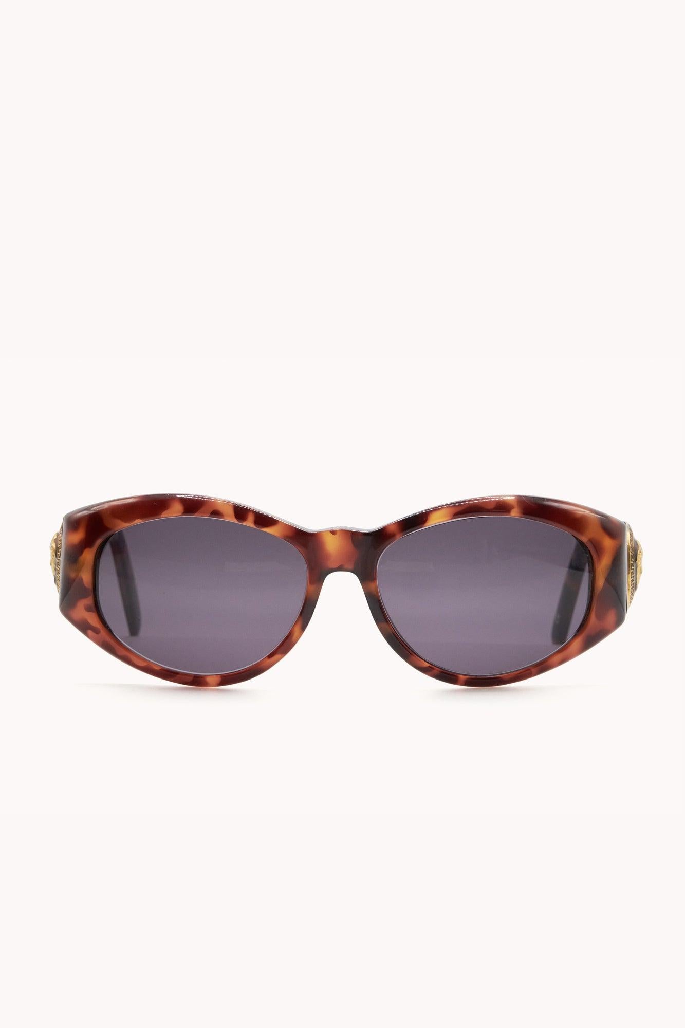 90s Gianni Versace brown tortoise shell frame sunglasses. Features gold tone medusa brand logo on each sides, brown frame, and black lenses 