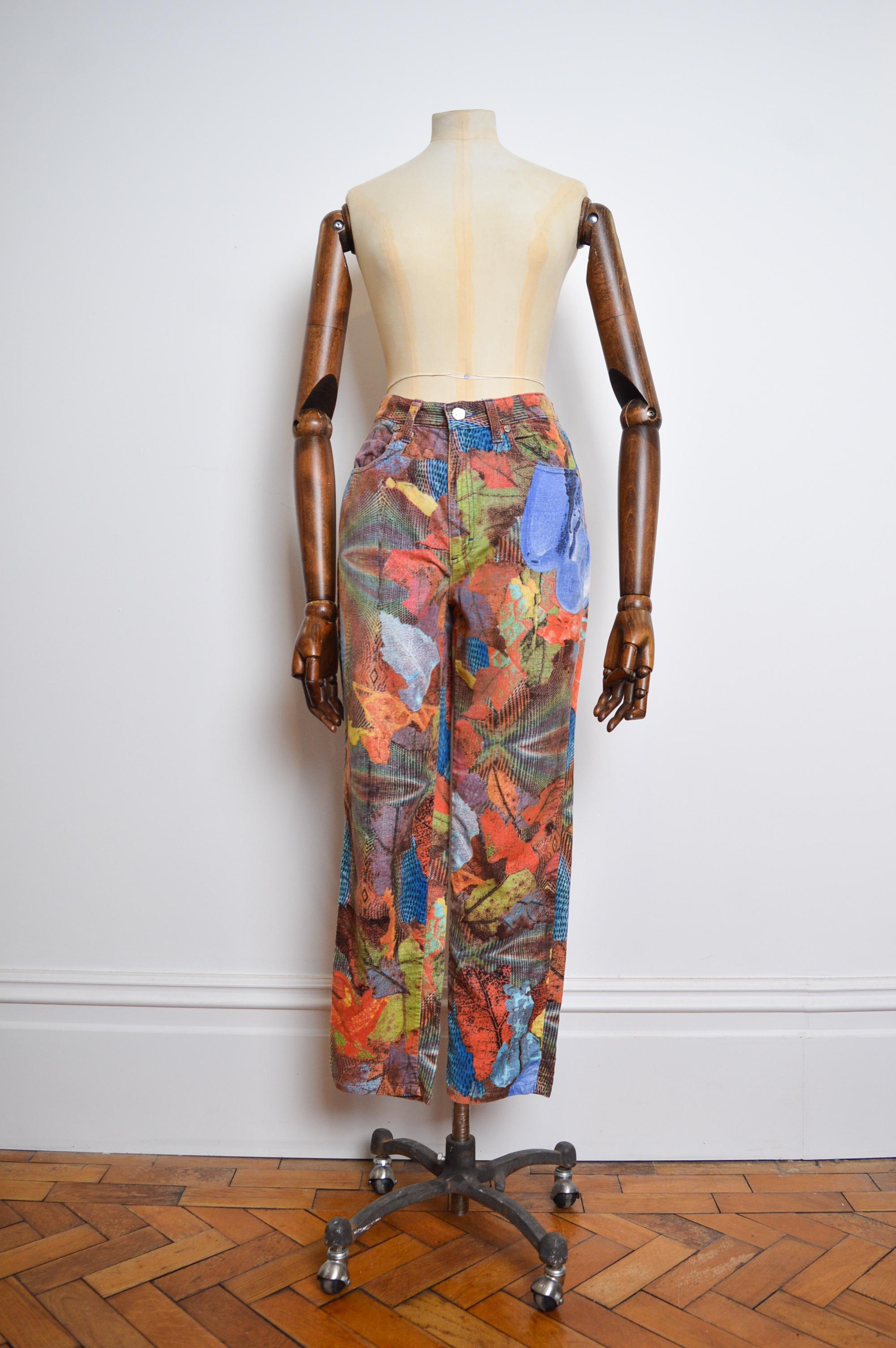 Superb, Trippy Vintage, 1990's High Waisted pants by CHRISTIAN LACROIX.   

MADE IN ITALY.

Features ; 100% Cotton / Zip and Button closure / Classic 4 Pocket design, Pshychedelic printed super soft velvet material.  

Measurements are provided in